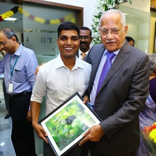 Recognition moment featuring Medifly Healthcare founder at a formal award event